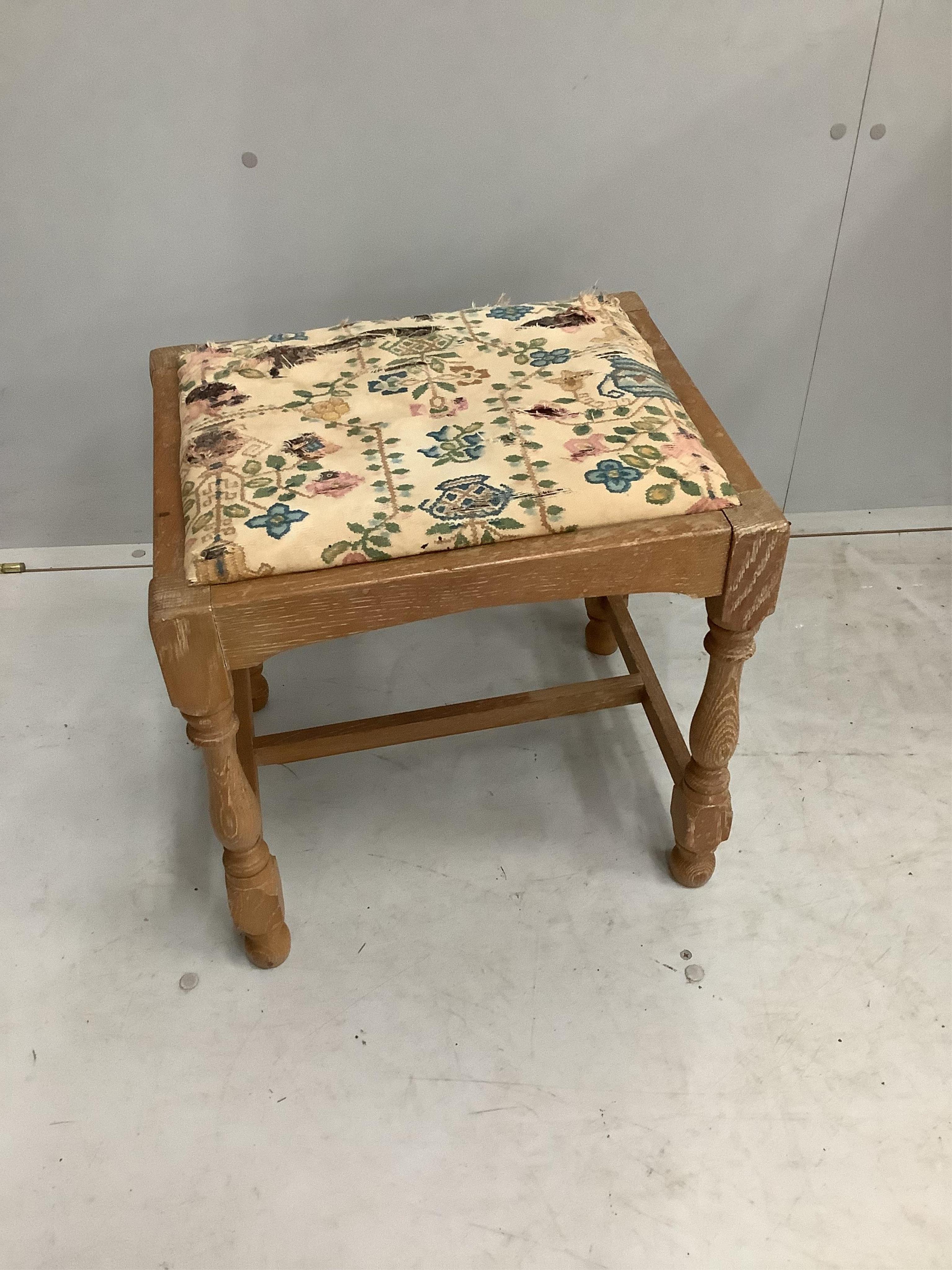 A painted limed oak eight piece bedroom suite, comprising a pair of three drawer chests, pair of bedside cabinets, dressing table stool, wardrobe and headboard. Condition - fair